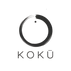 A minimalist black logo featuring a circular brushstroke design with a small dot above it and the word 'KOKŌ' beneath, centered on a plain white background.